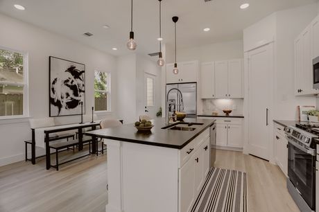 Kitchen with island at Marcella Estates