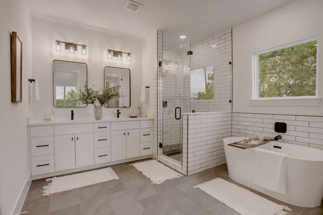 Primary bathroom double vanity at Marcella Estates