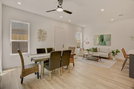 Living and dining area of an Archers Villas townhome