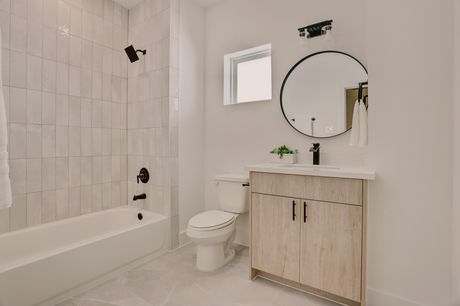 Secondary bathroom with tub-shower combo