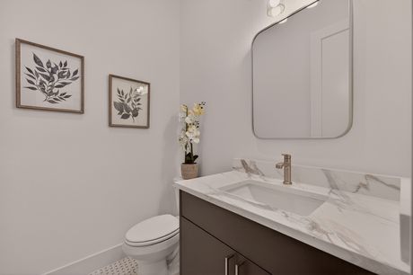 Powder bathroom off the entry at Donovan Vista