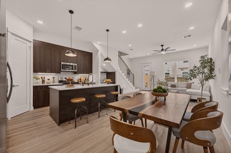 Kitchen with island seating at Donovan Vista