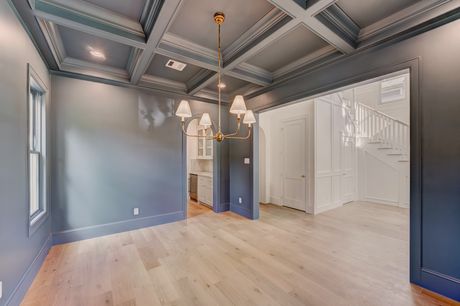 Dining room with coffered ceiling at the Stephan Custom Residence