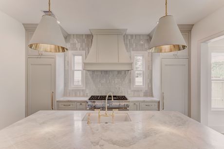Kitchen range and hood at the Stephan Custom Residence